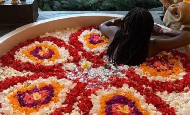 swim in flower petals in Bali with travel gen