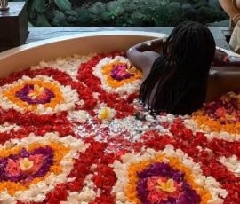 swim in flower petals in Bali with travel gen